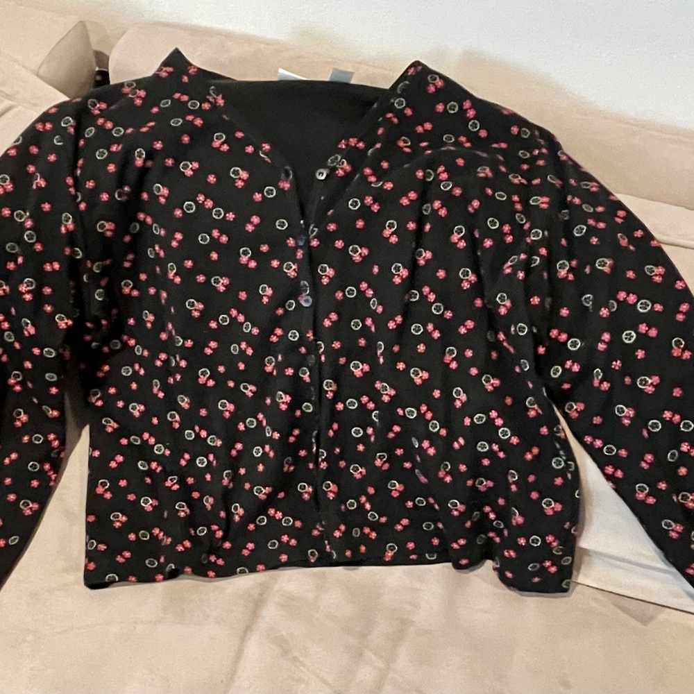 Beautiful, lightweight cardigan. Black background with floral pattern all over!